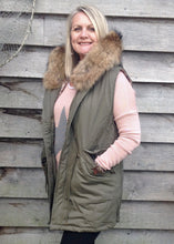 Load image into Gallery viewer, Fur Hood Parker Gilet with sequinned detail in Green - Feathers Of Italy