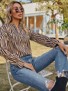 Capri Zebra Striped Notched Blouse